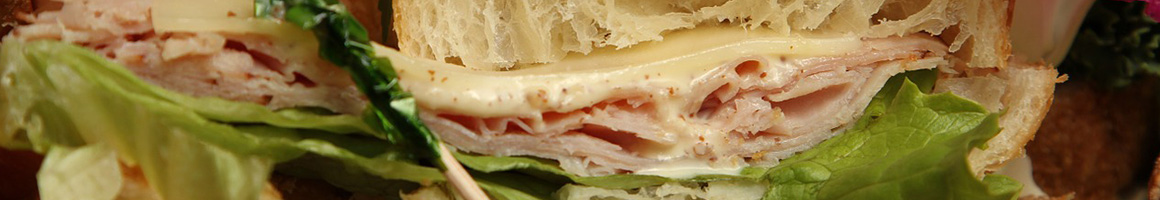 Eating Sandwich at Carnegies restaurant in Redding, CA.